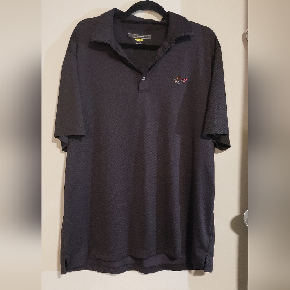 Greg Norman polo shirt. Color Black. Size XXL.